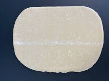 Fond de tarte flambée (flammekueche) ovale prêt à garnir pour une cuisson parfaite à Bernolsheim proche Haguenau en Alsace